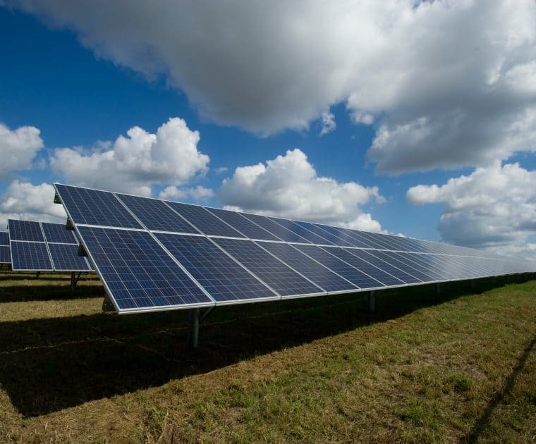 Solar panels on a green field